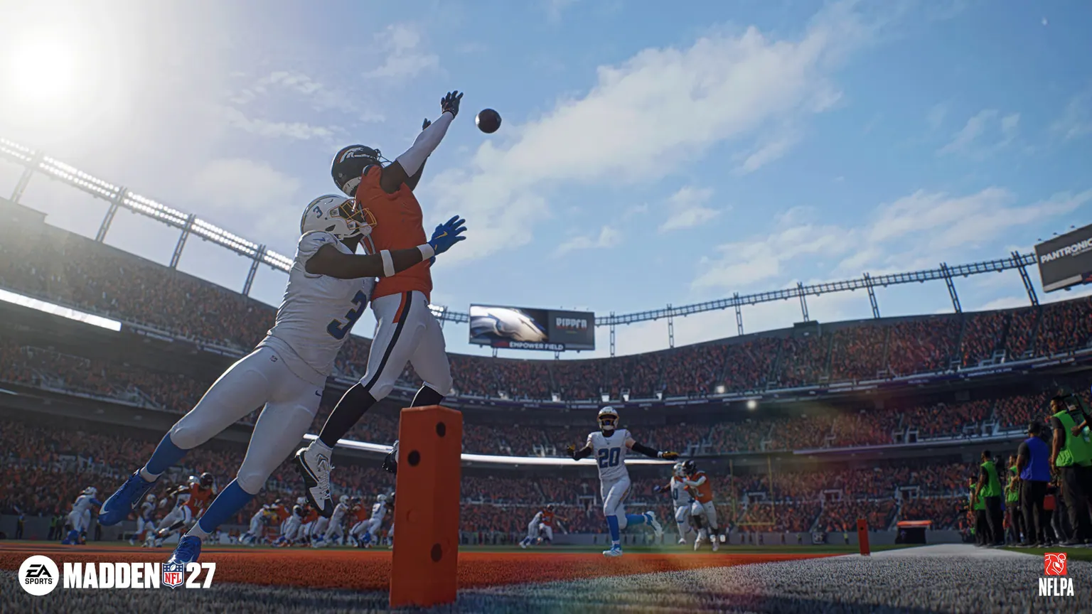 A receiver and defender contest a catch in an official Madden NFL 27 gameplay screenshot